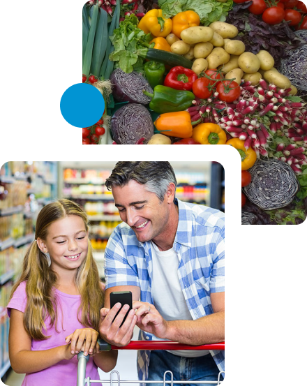 produce and an adult male and child grocery shopping together